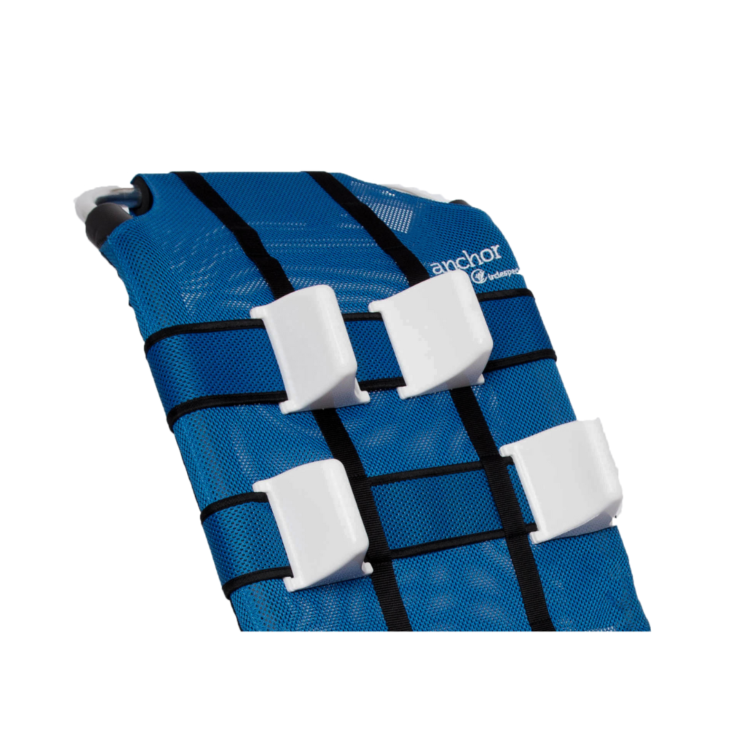 A close-up of the Lateral Support For Anchor Bath Chair, featuring blue mesh fabric, black straps, and three white plastic clips for secure attachment and proper trunk alignment.